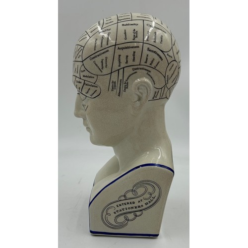 402 - A porcelain L N Fowler phrenology head. 29cm h.