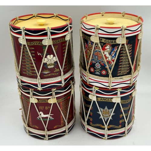 1005 - A collection of vintage Military Ice Buckets in the form of drums with regiment crests and campaigns... 