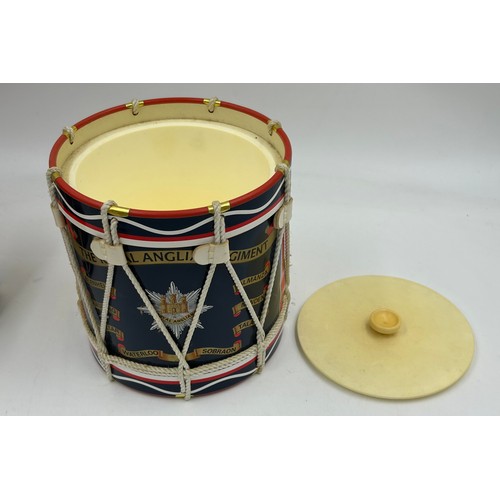 1005 - A collection of vintage Military Ice Buckets in the form of drums with regiment crests and campaigns... 