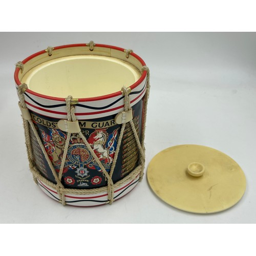 1005 - A collection of vintage Military Ice Buckets in the form of drums with regiment crests and campaigns... 