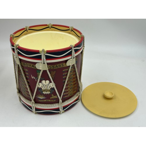 1005 - A collection of vintage Military Ice Buckets in the form of drums with regiment crests and campaigns... 