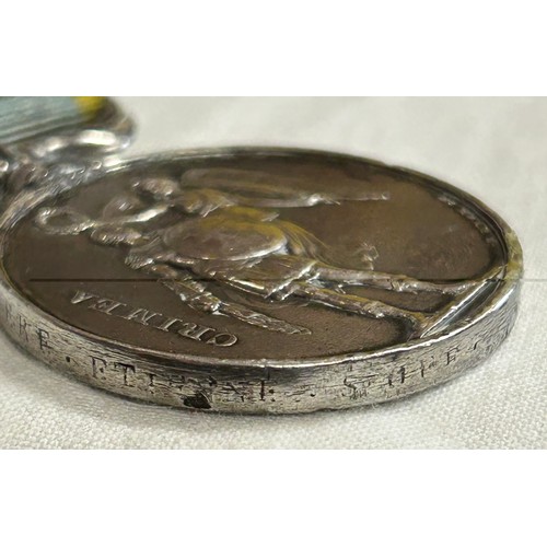 1007 - Crimea War Medal (1854-56) with Sebastopol clasp, name illegible engraved on the edge and some fadin... 