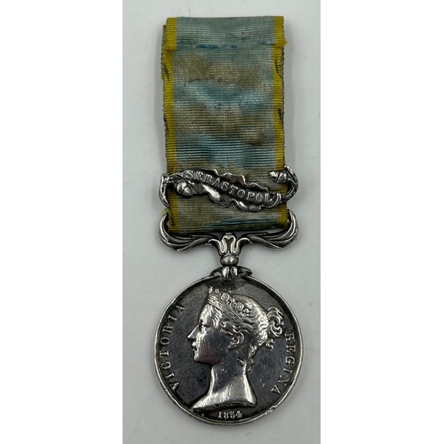 1007 - Crimea War Medal (1854-56) with Sebastopol clasp, name illegible engraved on the edge and some fadin... 