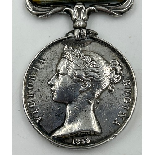 1007 - Crimea War Medal (1854-56) with Sebastopol clasp, name illegible engraved on the edge and some fadin... 