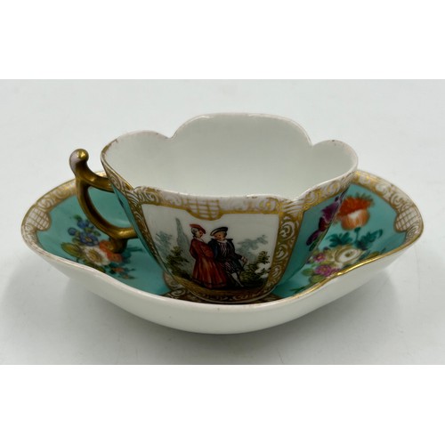 412 - A collection of Dresden porcelain to include a matching cup and saucer, 2 x white floral cups with o... 