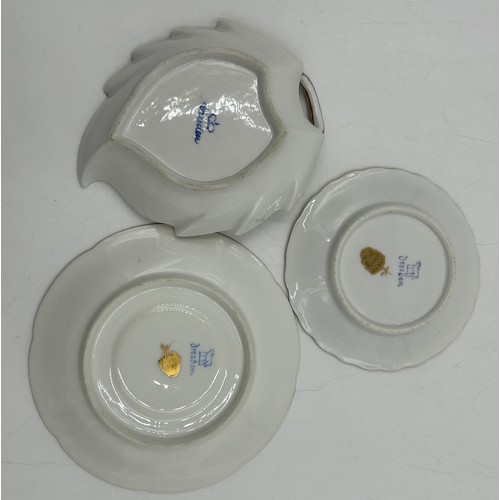 412 - A collection of Dresden porcelain to include a matching cup and saucer, 2 x white floral cups with o... 