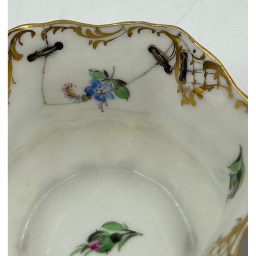 412 - A collection of Dresden porcelain to include a matching cup and saucer, 2 x white floral cups with o... 