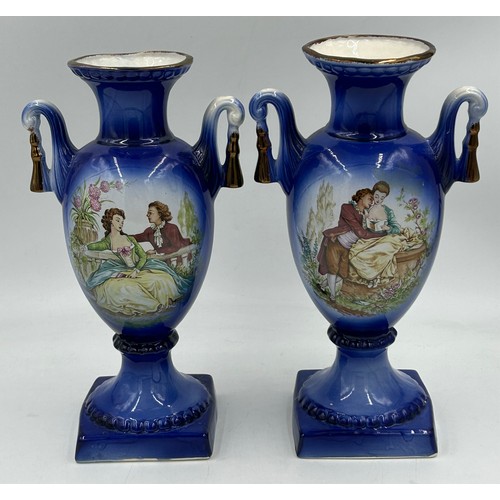 413 - A Staffordshire jardinière/planter and a pair of cobalt blue twin handled vases measuring 31cm high.