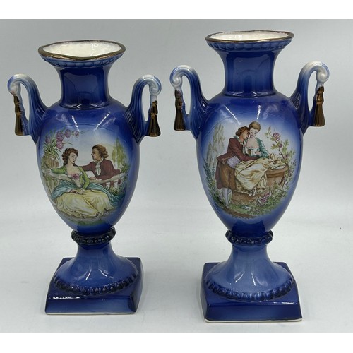 413 - A Staffordshire jardinière/planter and a pair of cobalt blue twin handled vases measuring 31cm high.