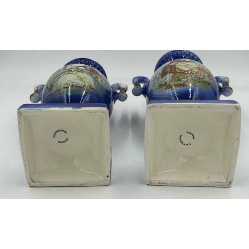 413 - A Staffordshire jardinière/planter and a pair of cobalt blue twin handled vases measuring 31cm high.