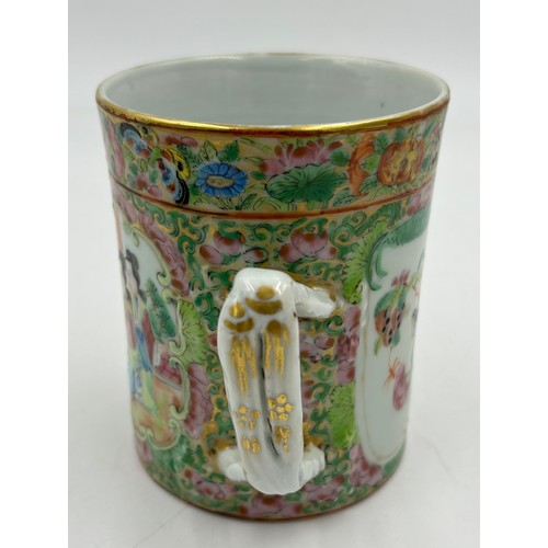 941 - Two 19thC  oriental items to include a large brush pot with ribbon twist handle hand painted with wo... 