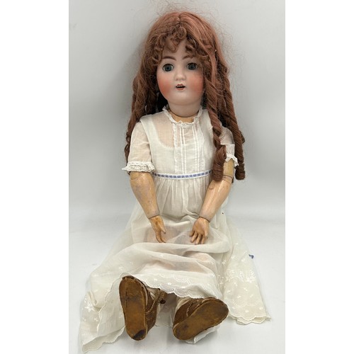 1113 - An Alt, Beck & Gottschalk 1362 Bisque Headed Doll with composition body and jointed limbs, weighted ... 