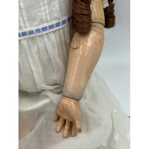 1113 - An Alt, Beck & Gottschalk 1362 Bisque Headed Doll with composition body and jointed limbs, weighted ... 