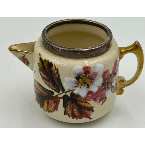 480 - A Taylor Tunniciffe & Co ceramic teapot, sugar bowl and milk jug in floral design with silver rims m... 