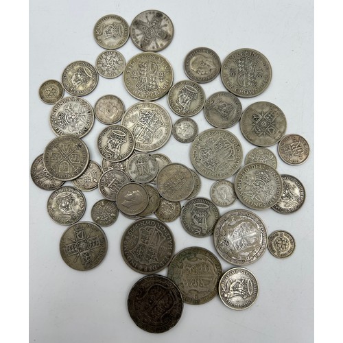 736 - A collection of silver pre 1921 UK coinage, to include a Victorian Jubilee head shilling 1887, a Geo... 