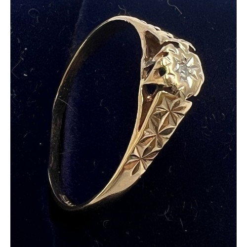 570 - A 9 carat gold diamond set ring. Size R. Weight 1.4gm.