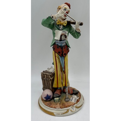 419 - A collection of Porcelain Clowns to include Capodimonte 'Clown Busker' 35cm signed to base along wit... 