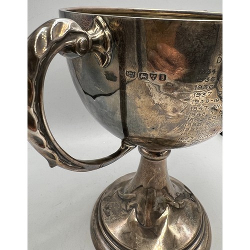 822 - Hallmarked silver twin handled trophy. Hull Lawn Tennis League Mixed Doubles Trophy. Chester 1927. 2... 