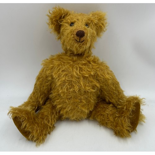 1114 - A vintage Mohair Growling Teddy with movable head, joints, velvet feet, stitched nose and black glas... 