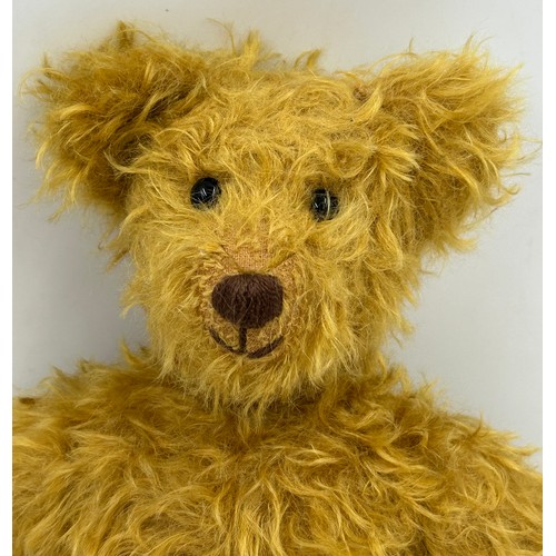 1114 - A vintage Mohair Growling Teddy with movable head, joints, velvet feet, stitched nose and black glas... 