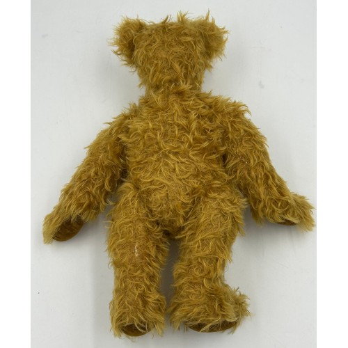 1114 - A vintage Mohair Growling Teddy with movable head, joints, velvet feet, stitched nose and black glas... 