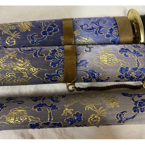 1225 - A set of three blue dragon Kitana swords decorated in blue and gold fabric (3).