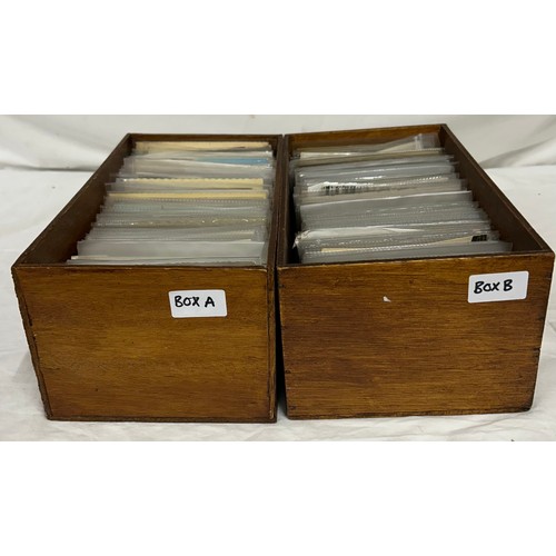 919 - A large collection of topographic and real photo Postcards in 2 x wooden boxes. Box A containing 420... 