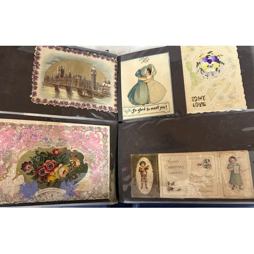 922 - A collection of Postcards in three albums to include Edwardian Romance and Greetings (180), embroide... 