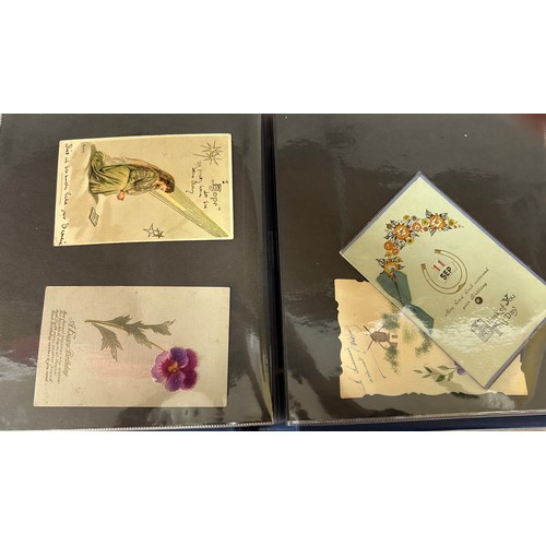 922 - A collection of Postcards in three albums to include Edwardian Romance and Greetings (180), embroide... 