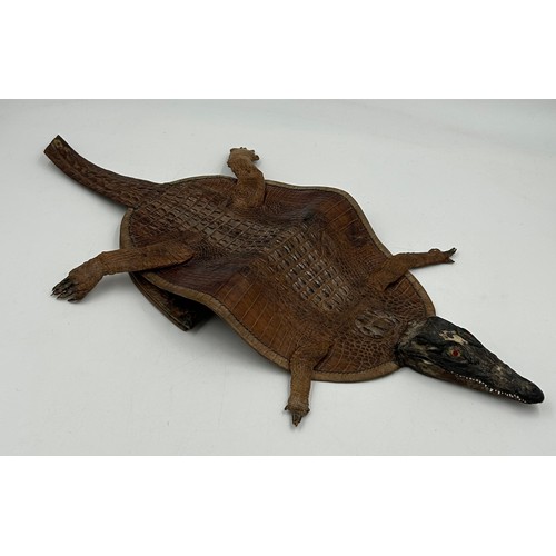 1226 - A miscellany of items to include an alligator handbag, a horn carved in the shape of a bird 30cm, Ro... 