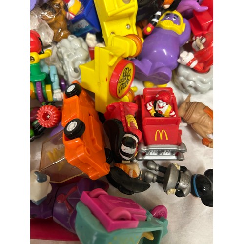 1117 - A large quantity of promotional toys associated with McDonalds Happy Meals (120), TY Beanie Babies (... 