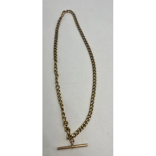 581 - A 9 carat gold chain with T bar and clip. Weight 11.2gm. Length 44cm.