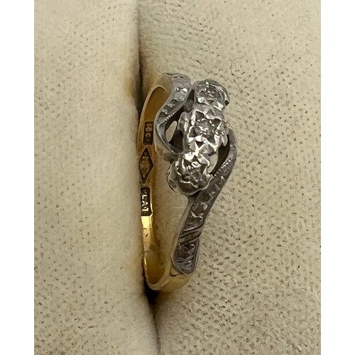 599 - An 18 carat gold and platinum diamond set ring, size J, weight 2.2gm.