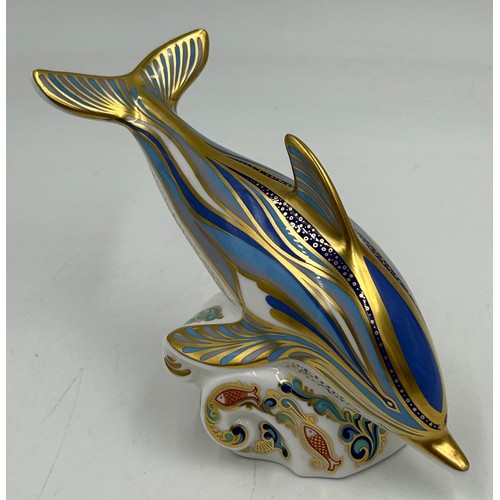 430 - A selection of Royal Crown Derby to include Dolphin Paperweight with gold stopper, Mandarin Duck pap... 