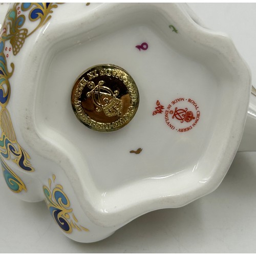 430 - A selection of Royal Crown Derby to include Dolphin Paperweight with gold stopper, Mandarin Duck pap... 