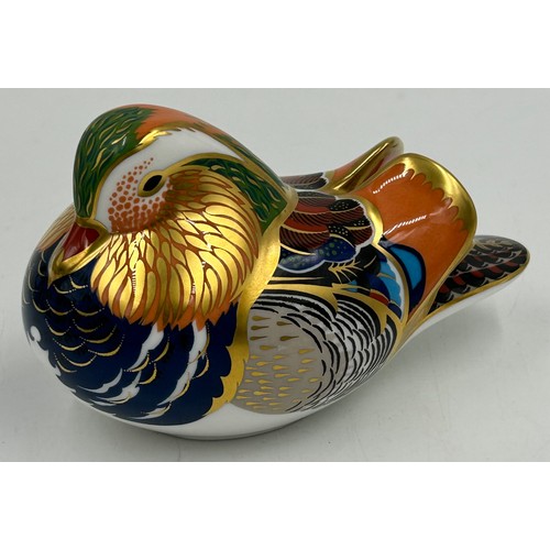 430 - A selection of Royal Crown Derby to include Dolphin Paperweight with gold stopper, Mandarin Duck pap... 