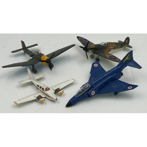 1119 - Four Dinky Toy Meccano Ltd Aircraft to include Spitfire MKII 719, Junkers JU 87 B 721, Phantom II F-... 