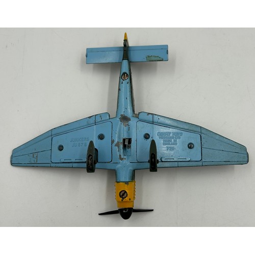 1119 - Four Dinky Toy Meccano Ltd Aircraft to include Spitfire MKII 719, Junkers JU 87 B 721, Phantom II F-... 