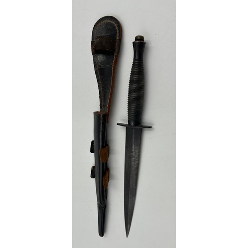 1008 - A Fairbairn Sykes 3rd pattern Commando Dagger by William Rogers, Sheffield with leather cover, maker... 