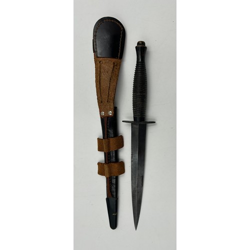 1008 - A Fairbairn Sykes 3rd pattern Commando Dagger by William Rogers, Sheffield with leather cover, maker... 