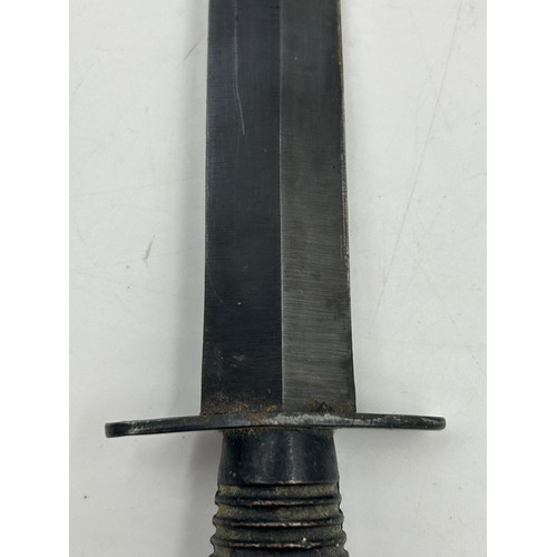 1008 - A Fairbairn Sykes 3rd pattern Commando Dagger by William Rogers, Sheffield with leather cover, maker... 