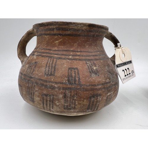 943 - Three Chinese Neolithic vessels to include a flared tazza, a single handled cup and twin handled bow... 