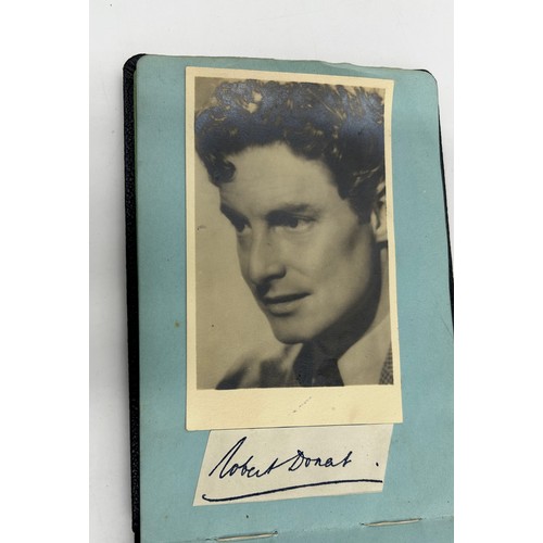 926 - An Autograph Book dated 1943 in the name of George William Dick containing handwritten autographs, p... 