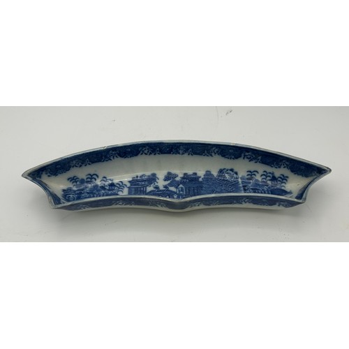 132 - A group of early 19th century blue and white transfer printed Two Figures pattern wares, c.1800. To ... 