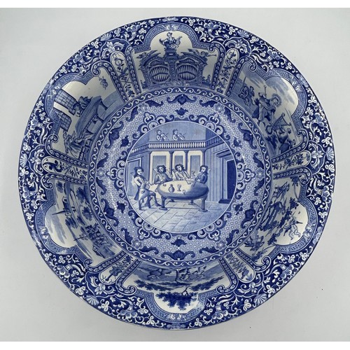 134 - An early 19th century blue and white transfer printed Spode Musicians pattern wash bowl, c. 1825. Ex... 