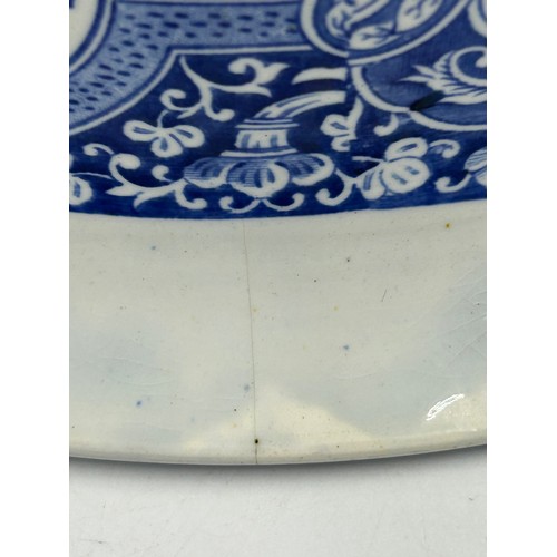 134 - An early 19th century blue and white transfer printed Spode Musicians pattern wash bowl, c. 1825. Ex... 