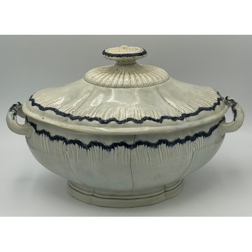 161 - An early 19th century pearlware blue and white hand-painted, shell edge soup tureen and cover c. 181... 