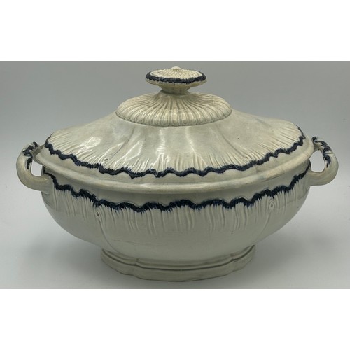 161 - An early 19th century pearlware blue and white hand-painted, shell edge soup tureen and cover c. 181... 