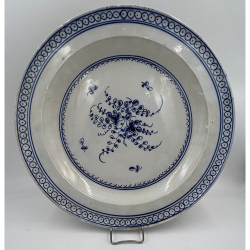 163 - Two early 19th century pearlware blue and white hand-painted large floral design chargers c. 1810. 3... 