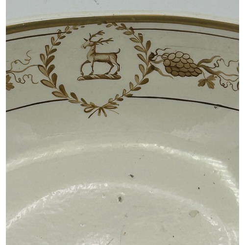 182 - An early 19th century Spode hand-painted creamware armorial dish, c. 1820. 19 cm wide. (1)

Conditio... 